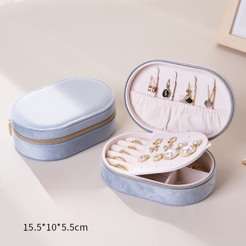 Oval flip-top velvet ring storage box