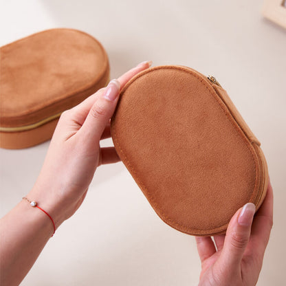 Oval flip-top velvet ring storage box