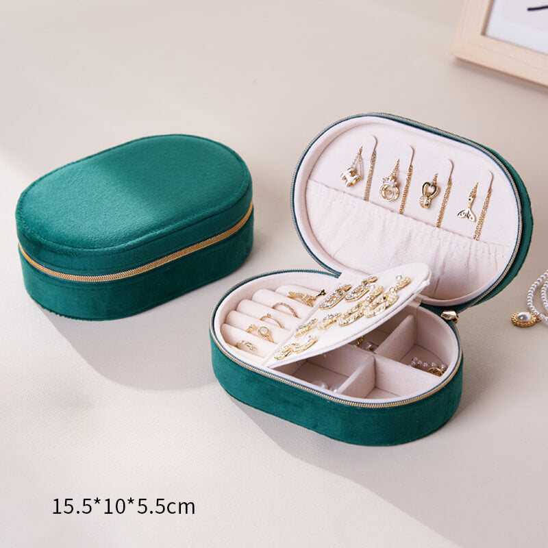 Oval flip-top velvet ring storage box