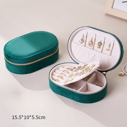 Oval flip-top velvet ring storage box