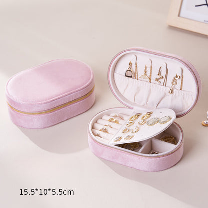 Oval flip-top velvet ring storage box