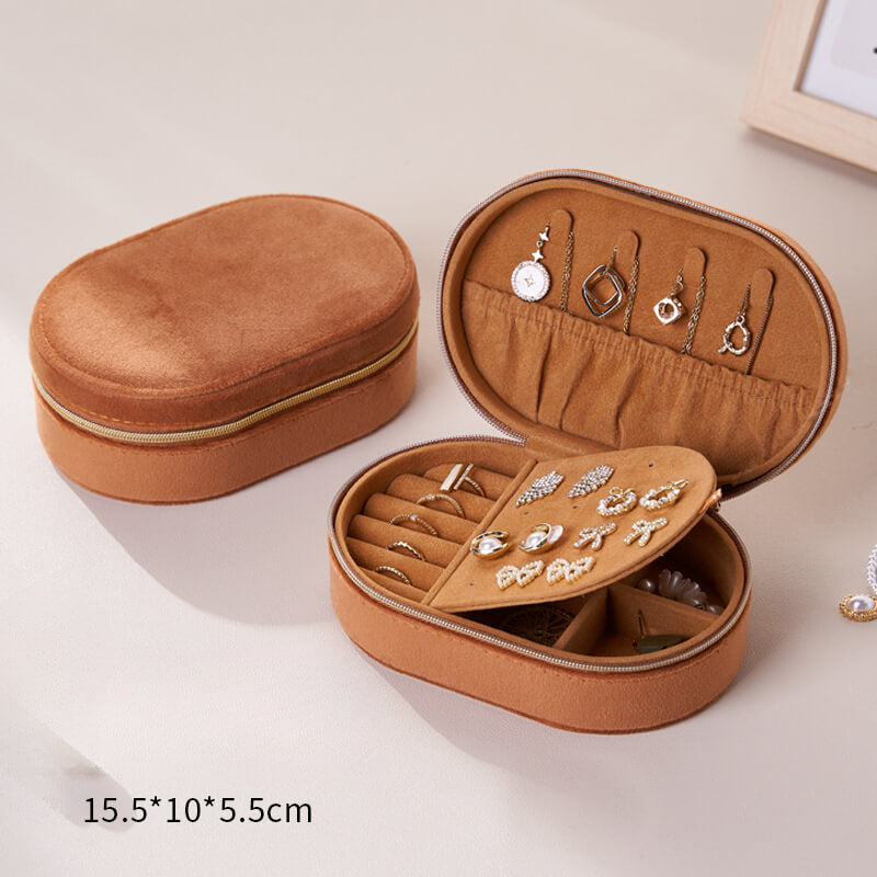Oval flip-top velvet ring storage box